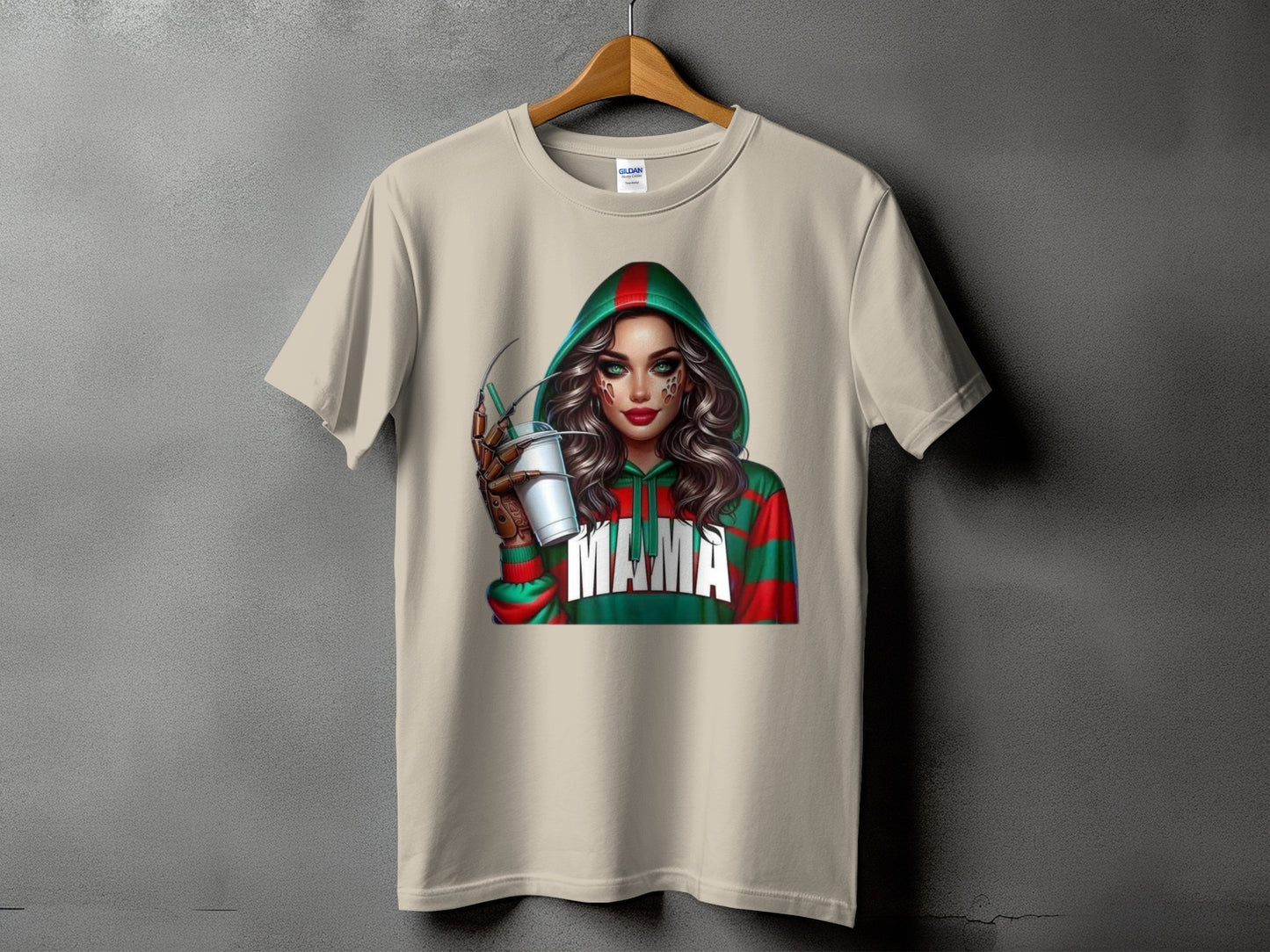 T-shirt with graphic of woman in striped hoodie holding drink, text reads "MAMA".