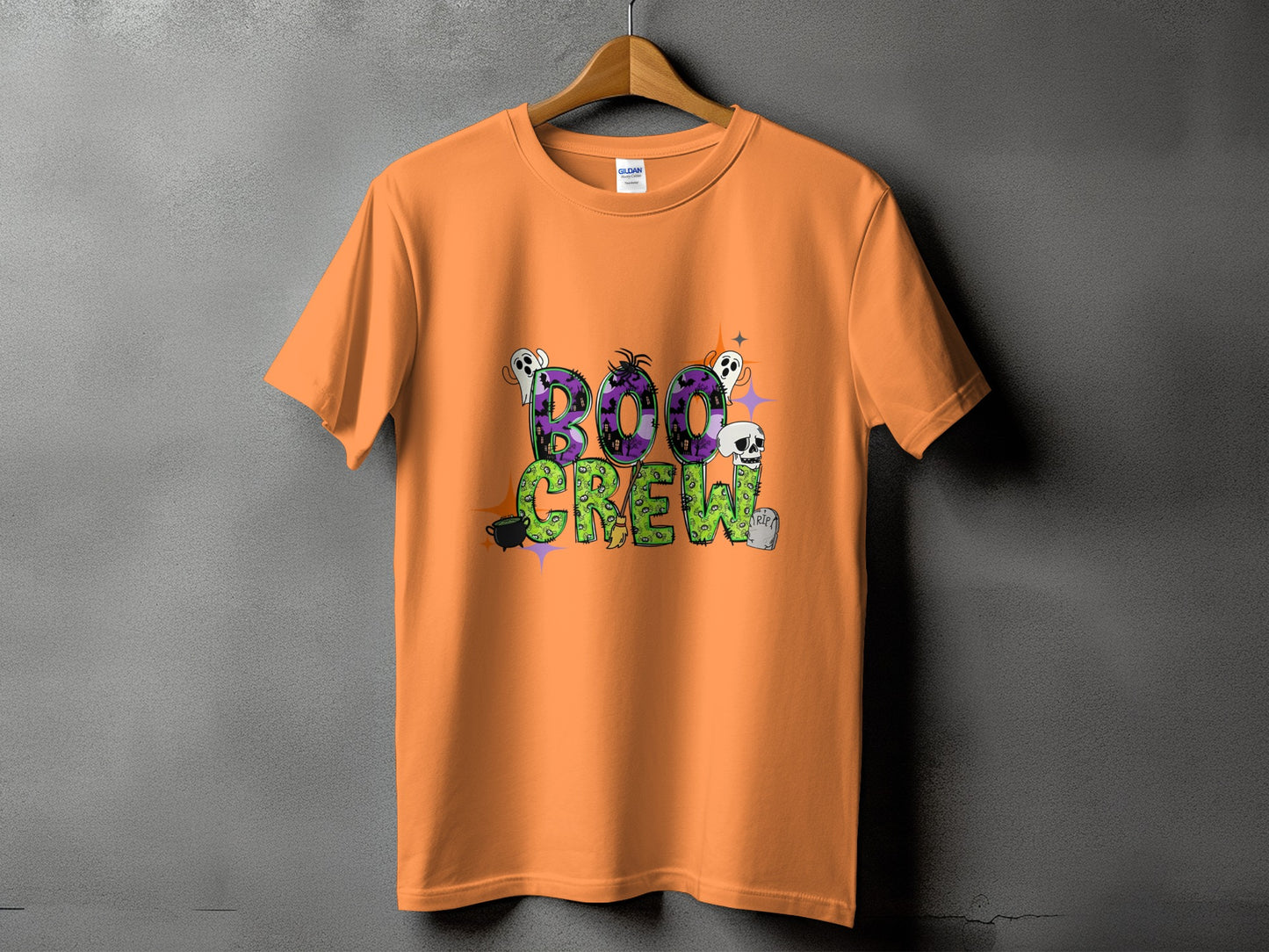 Orange t-shirt with "Boo Crew" text and Halloween graphics.