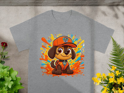 Chase from Paw Patrol on a grey t-shirt with colorful splatters.