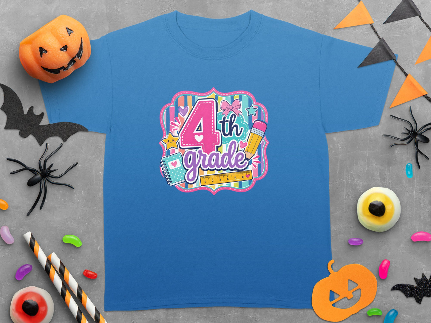 Blue t-shirt with "4th grade" text, pencil, ruler, and notebook graphic.