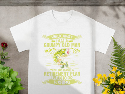White t-shirt with yellow text and fishing graphic: "Walk Away I am a Grumpy Old Man".