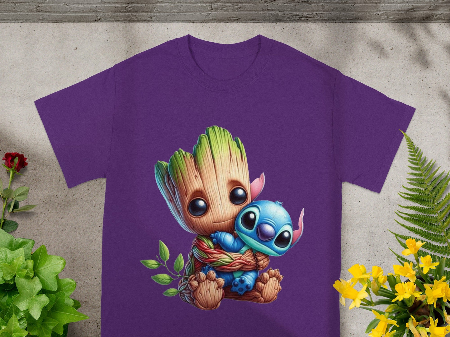 Groot hugging Stitch on a purple t-shirt.