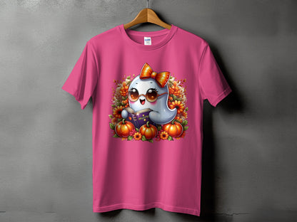 Pink t-shirt featuring a cartoon ghost with sunglasses and a bow reading a book.
