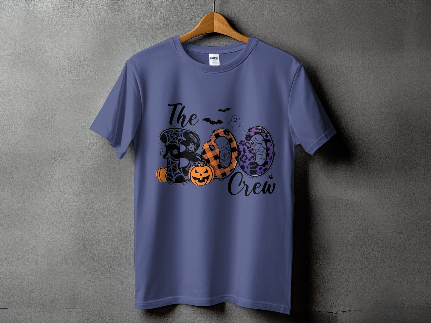 The Boo Crew graphic with Halloween motifs on a purple t-shirt.