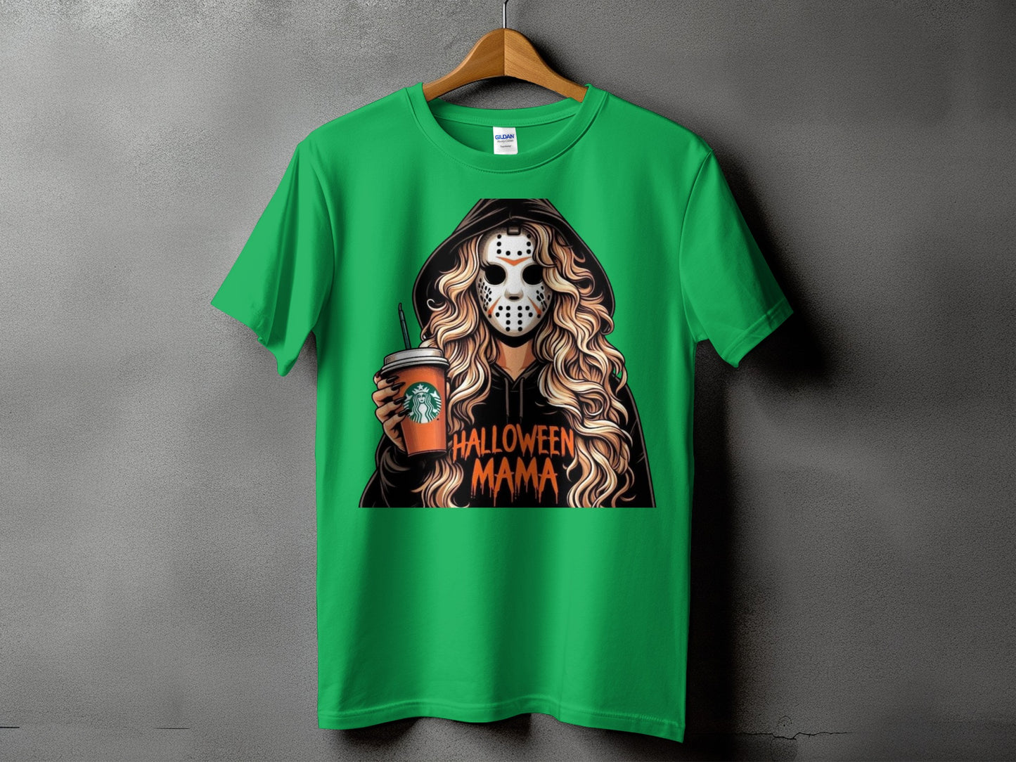 Green t-shirt with graphic of masked figure holding Starbucks cup, text Halloween Mama.