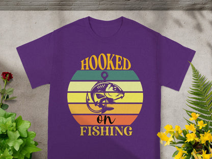 Purple t-shirt with "Hooked on Fishing" text and a fish design.