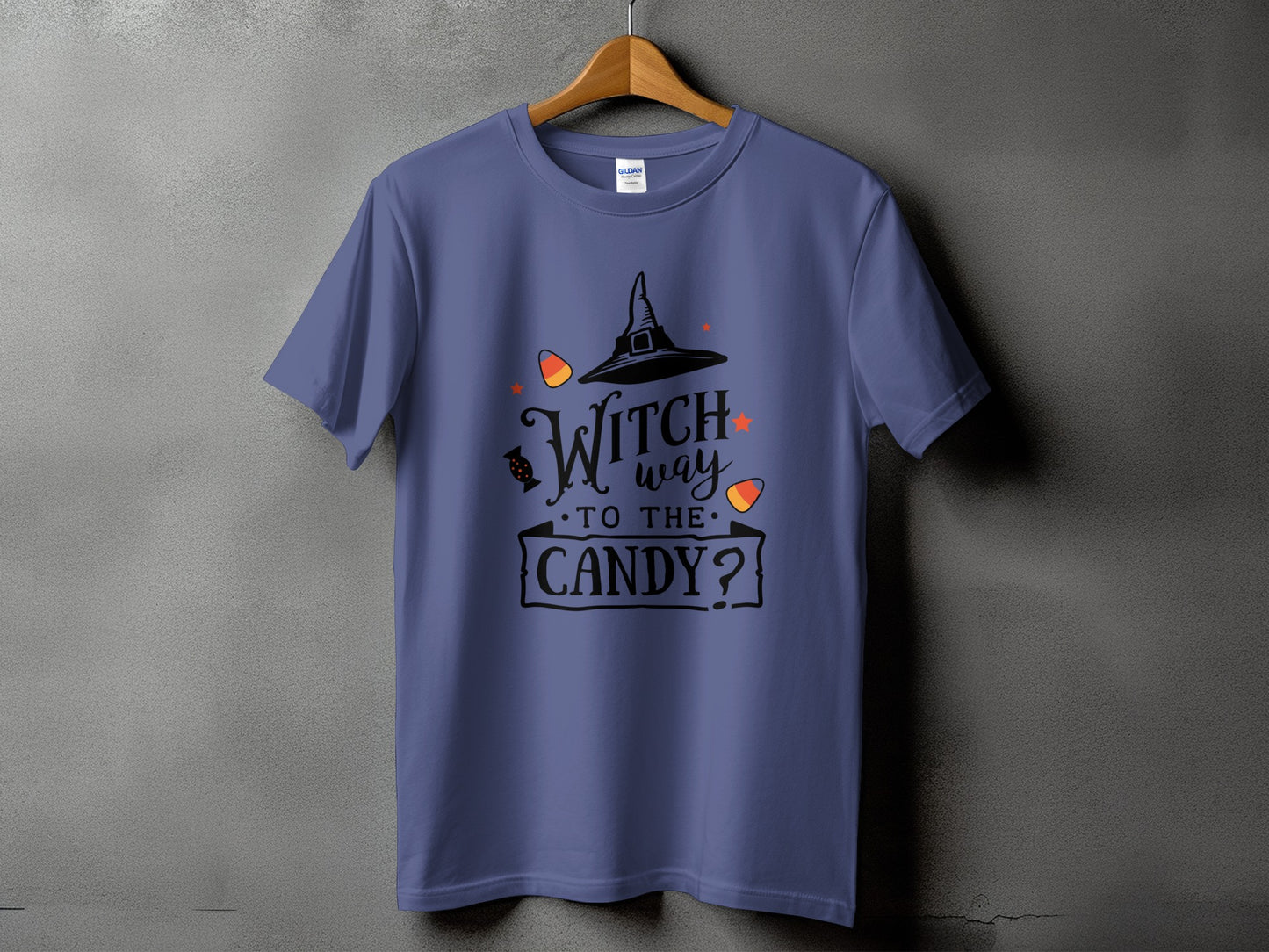 Purple t-shirt with Halloween graphic: Witch way to the candy?