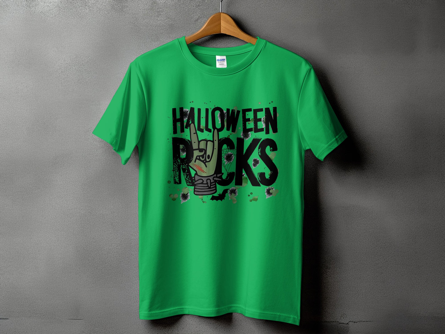 Green t-shirt with "Halloween Rocks" graphic featuring a monster hand and bats.