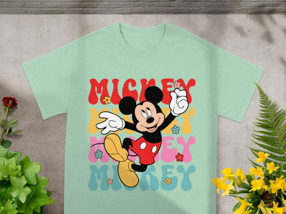Mint t-shirt with retro Mickey Mouse graphic and colorful flowers.