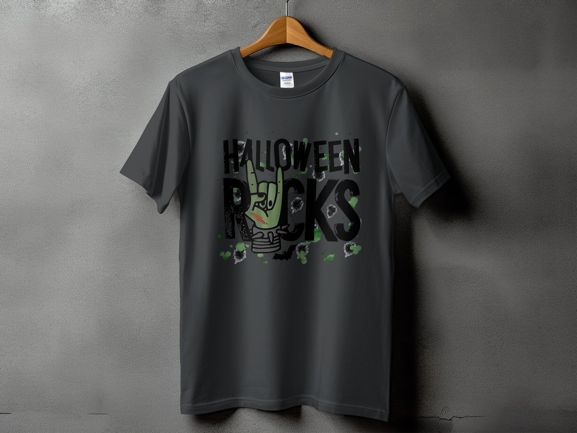 Dark grey t-shirt with "Halloween Rocks" text and zombie hand graphic.