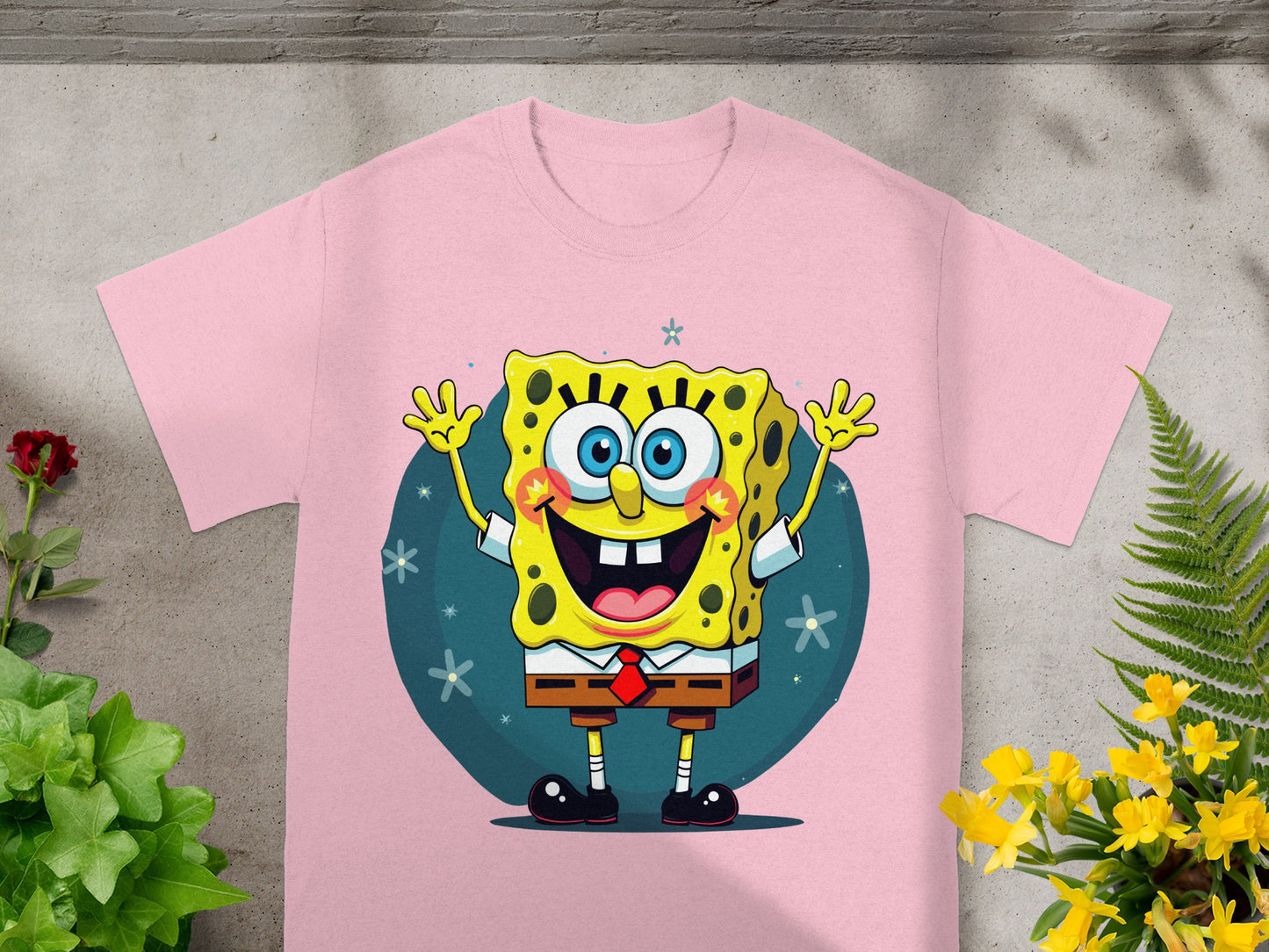 Pink t-shirt with Spongebob Squarepants character graphic and starry background.