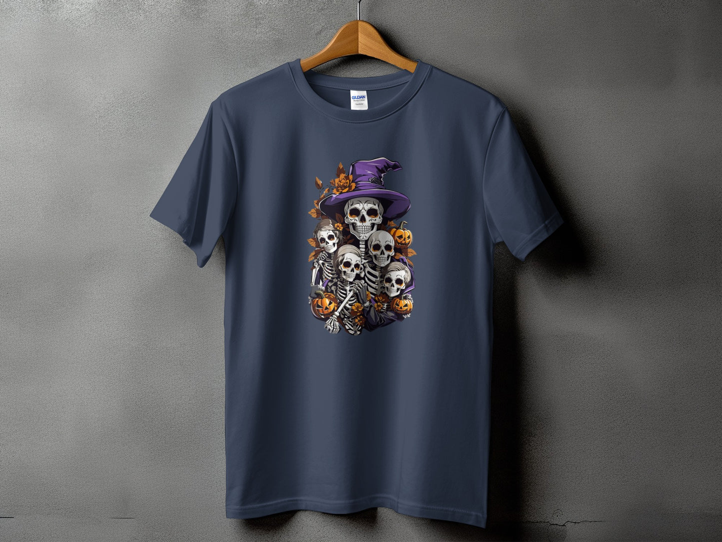 T-shirt with a group of skeletons wearing a witch hat and pumpkins.