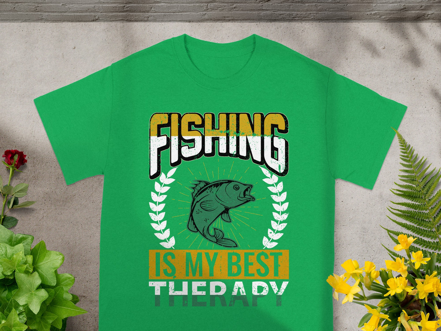 Green t-shirt graphic: "FISHING IS MY BEST THERAPY" with a fish.