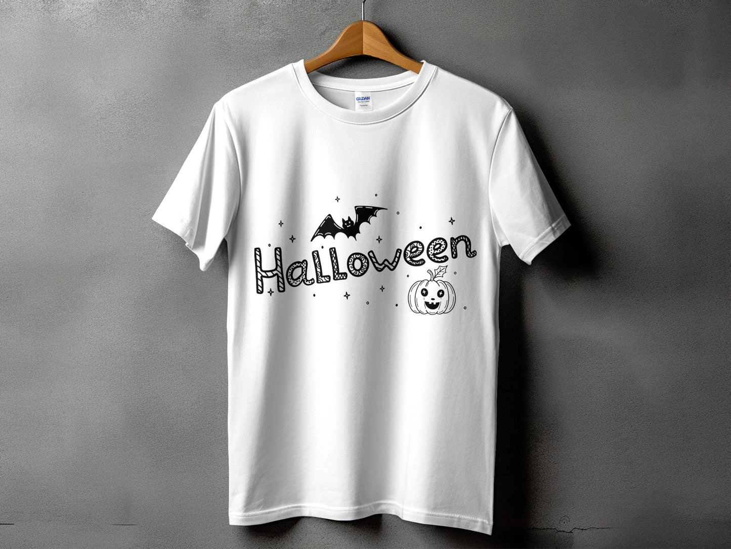 White t-shirt with black Halloween text, bat, and pumpkin graphic.