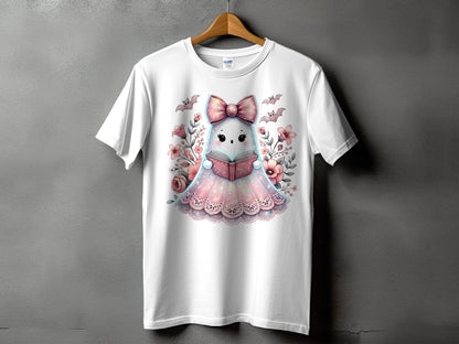 White t-shirt with a cute ghost reading a book, surrounded by flowers and bats.