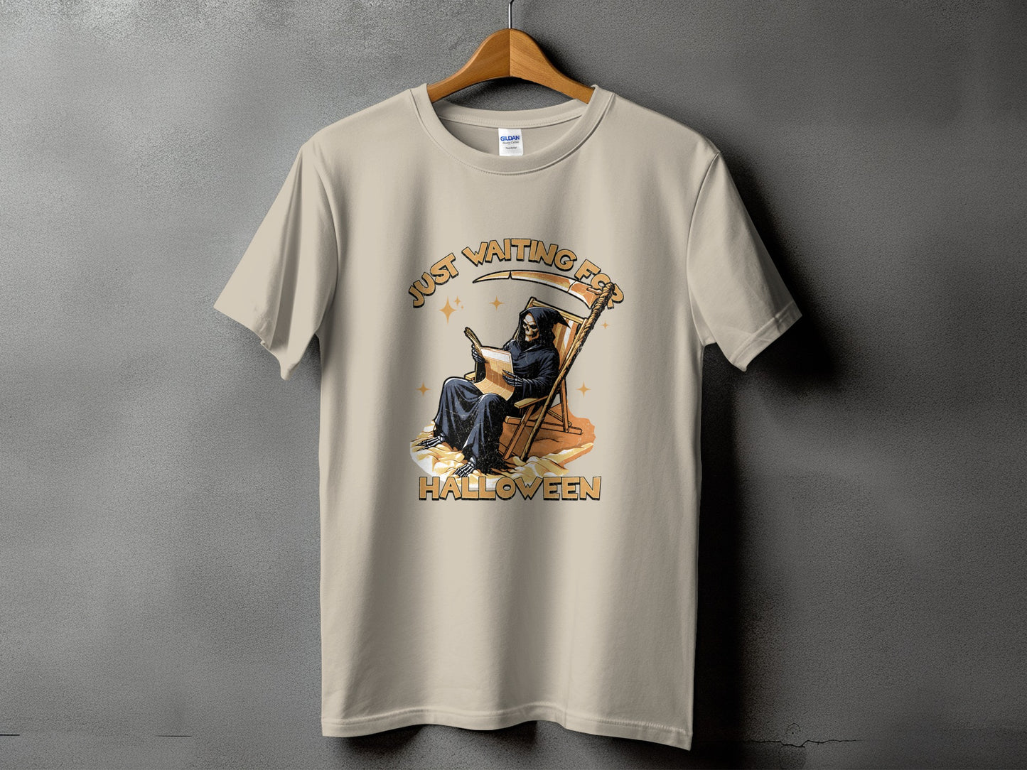 T-shirt with grim reaper graphic reading and text "Just Waiting For Halloween".