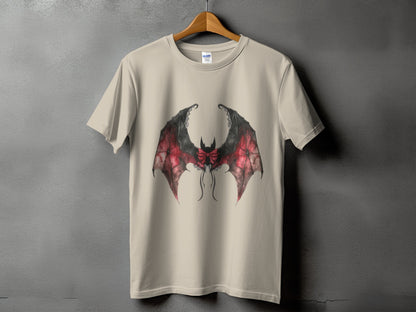 Beige t-shirt with a red and black bat wing design and a bow.