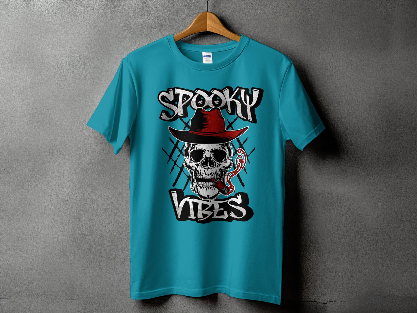 Teal t-shirt with "SPOOKY VIBES" text and a skull wearing a hat.