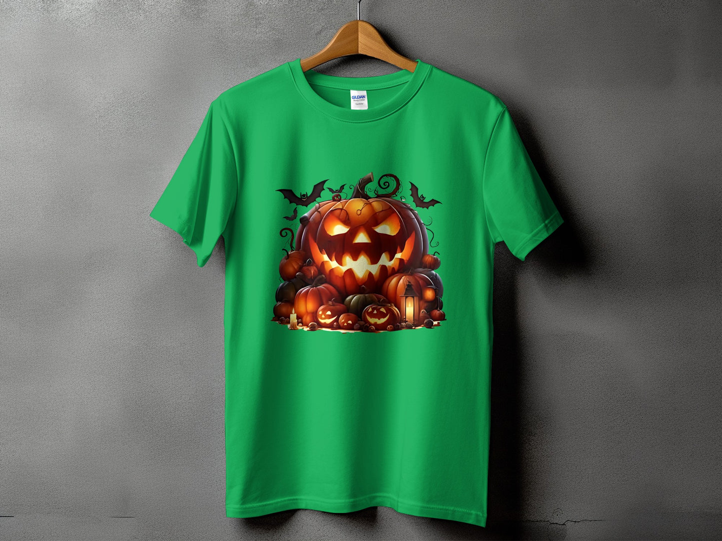 Green t-shirt with a Halloween graphic of jack-o'-lanterns and bats.