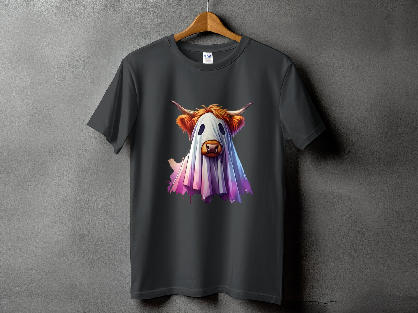 Dark gray t-shirt with a Highland cow dressed as a ghost graphic.
