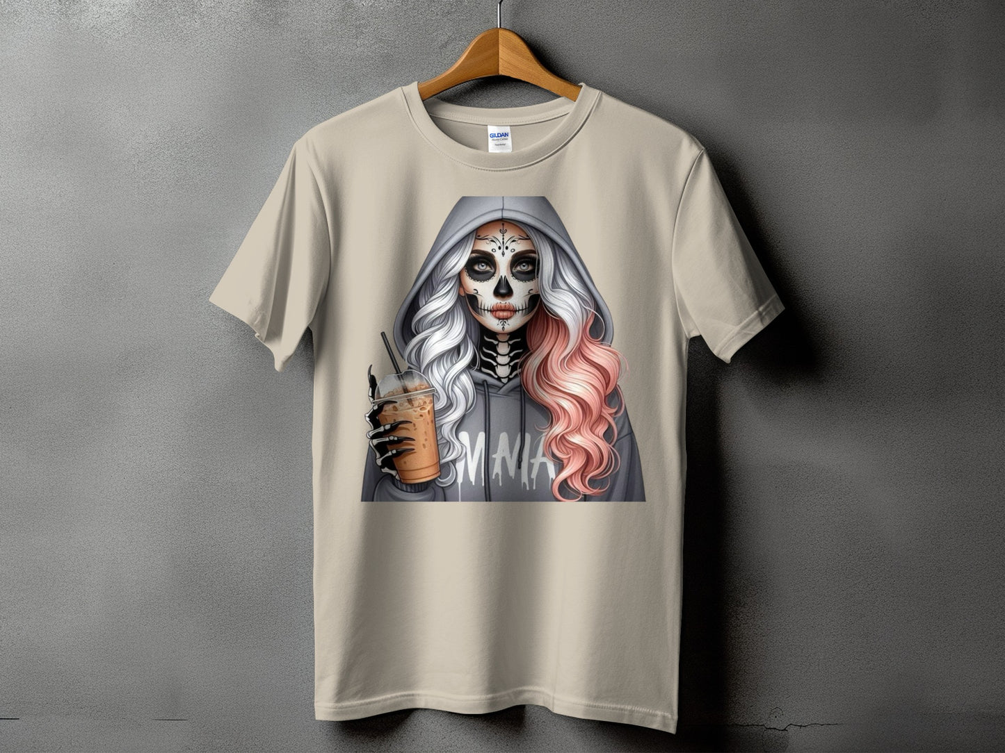 T-shirt with skeleton makeup woman holding iced coffee, gray hoodie with "MMA" graphic.