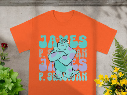 Orange t-shirt with cartoon character James P. Sullivan and psychedelic text.