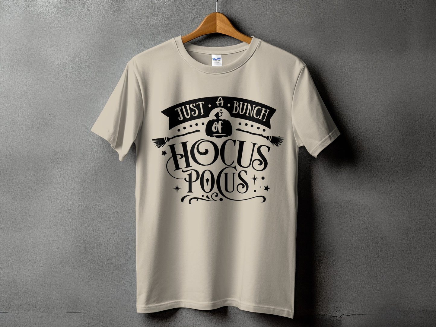 Cream t-shirt with "Just A Bunch of Hocus Pocus" graphic.