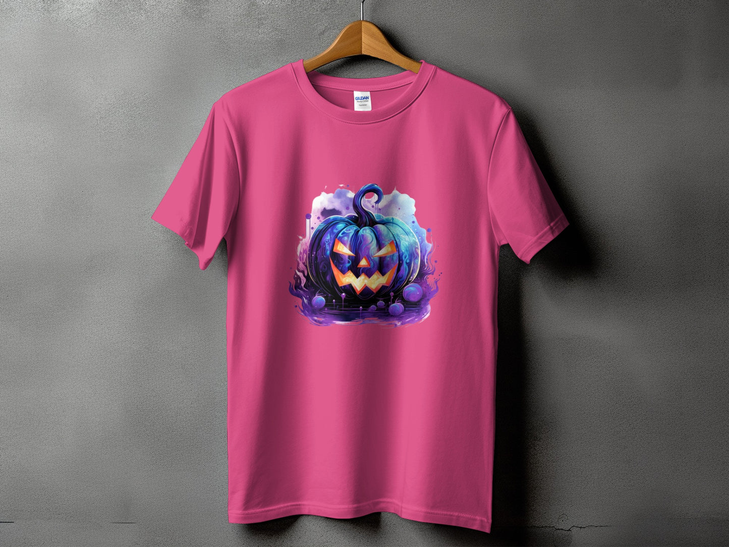 Pink t-shirt with a stylized, glowing jack-o'-lantern graphic on the front.