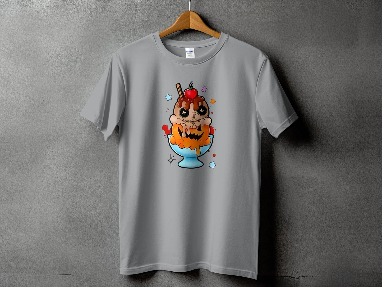 Gray t-shirt featuring a cartoon ice cream sundae with a jack-o'-lantern face.