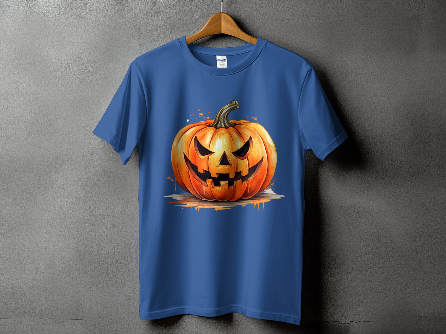 Blue t-shirt with a watercolor jack-o'-lantern design.