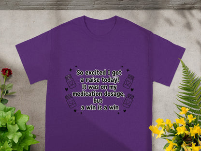Purple t-shirt with text about a raise on medication dosage.