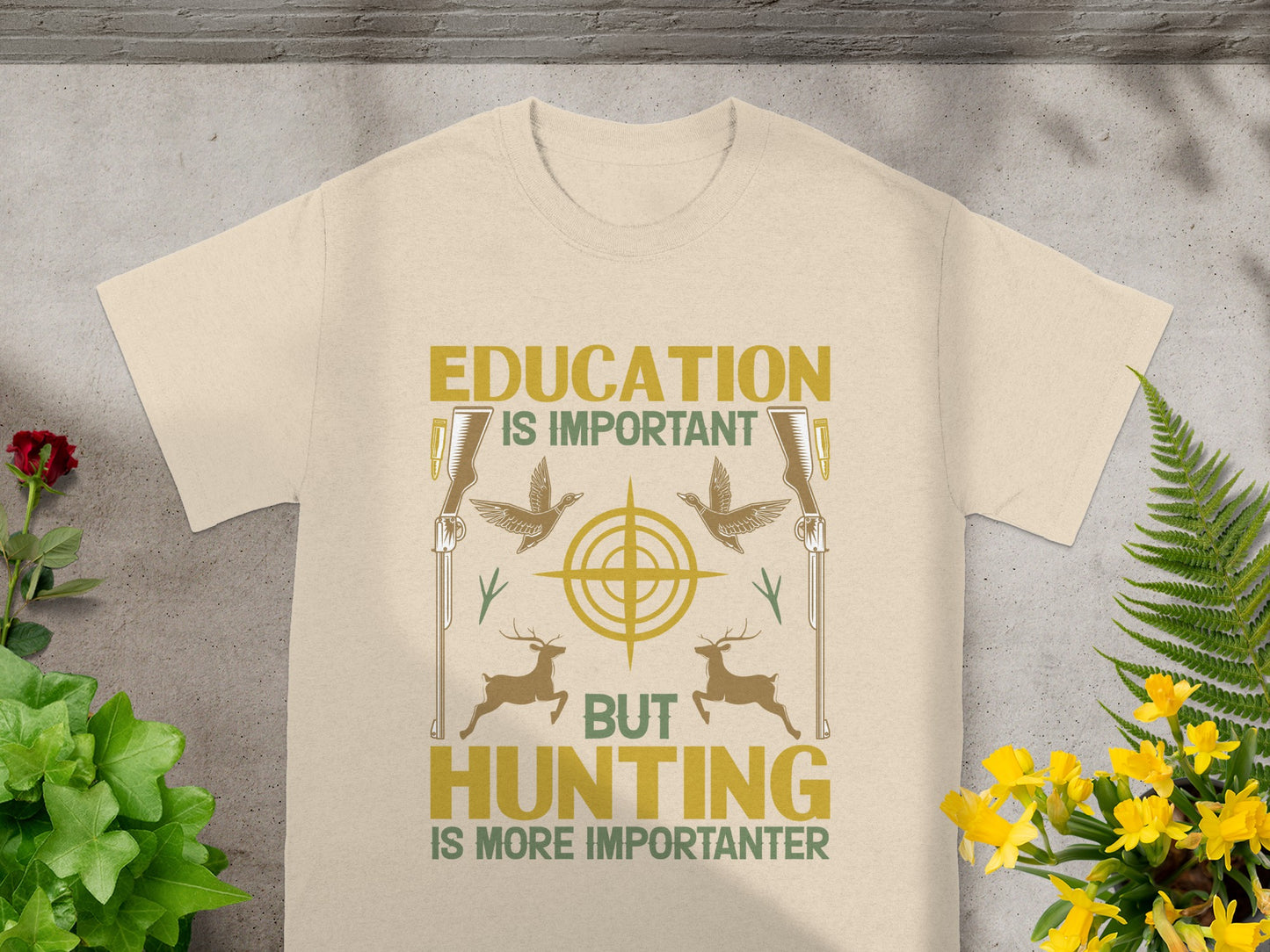 Light tan t-shirt with "Education is important, but hunting is more importanter" graphic.