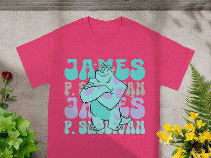 James P. Sullivan monster graphic on a pink t-shirt with foliage.