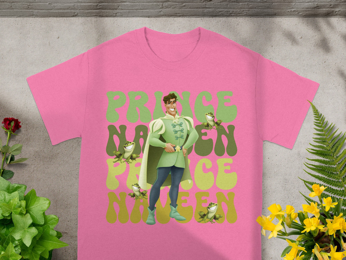 Pink t-shirt with Prince Naveen and frog graphic, "Prince Naveen Fifteen" text.