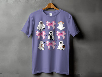 Purple t-shirt with a grid of nine illustrations featuring ghosts, pink bows, and Halloween elements.
