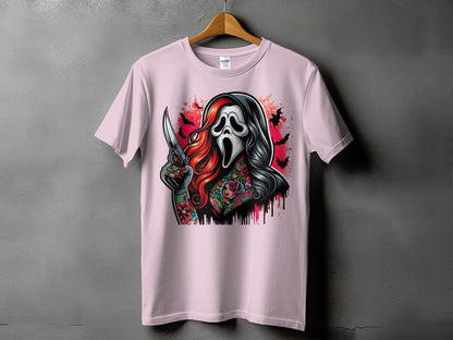 Pink t-shirt with graphic of Ghostface mask, knife, tattoos, and bats.