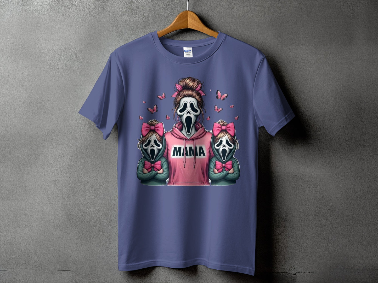 Ghost face mama graphic with two ghost face children on a purple t-shirt.