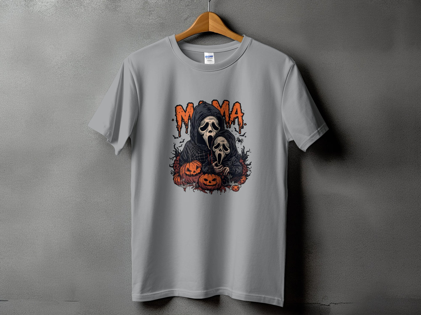 Grey t-shirt with "Mama" text and screaming ghost figures surrounded by pumpkins.