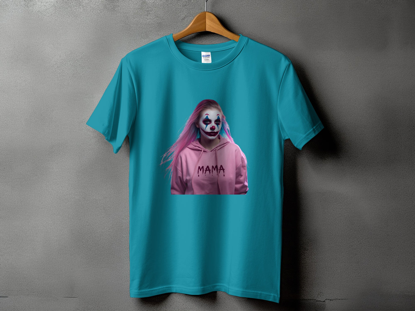 Turquoise t-shirt with a graphic of a person in clown makeup and a pink hoodie with "MAMA" printed on it.