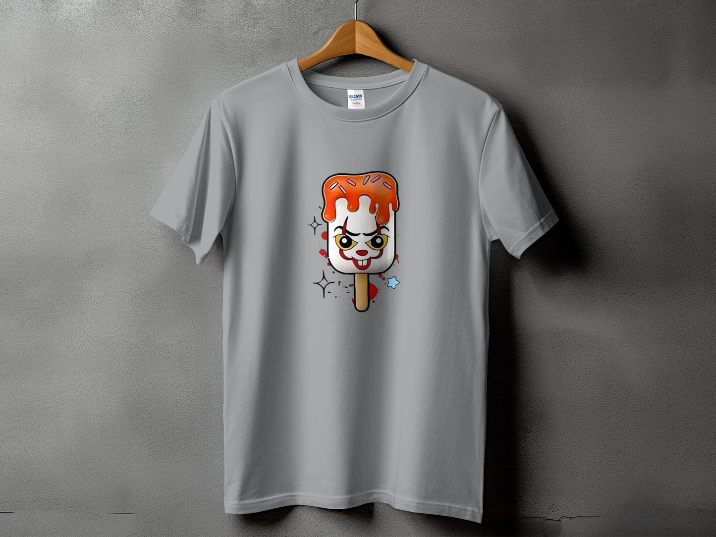 Gray t-shirt with a creepy clown popsicle graphic and Gildan label.