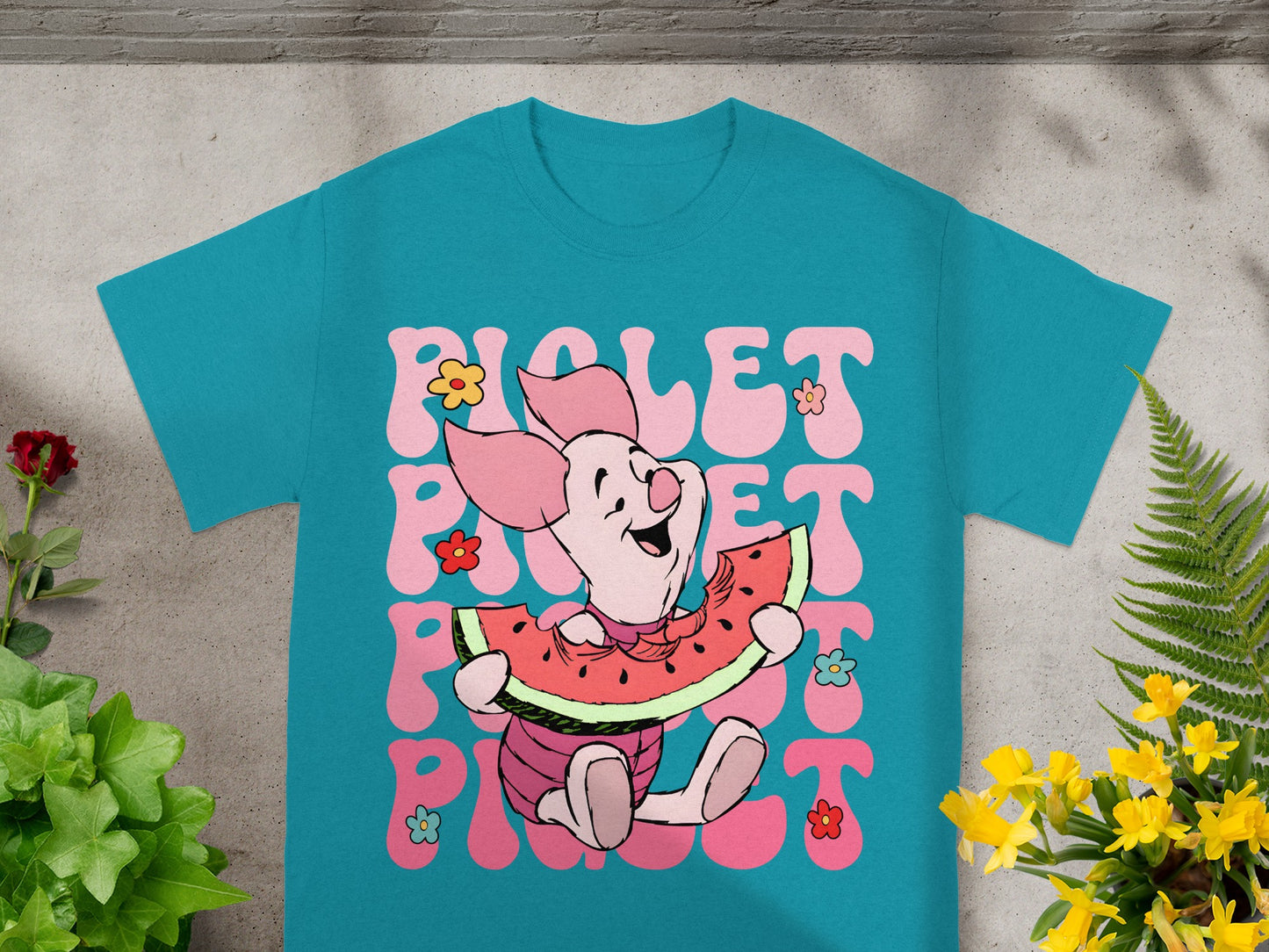 Piglet sitting and eating watermelon slice, with "Piglet" text.
