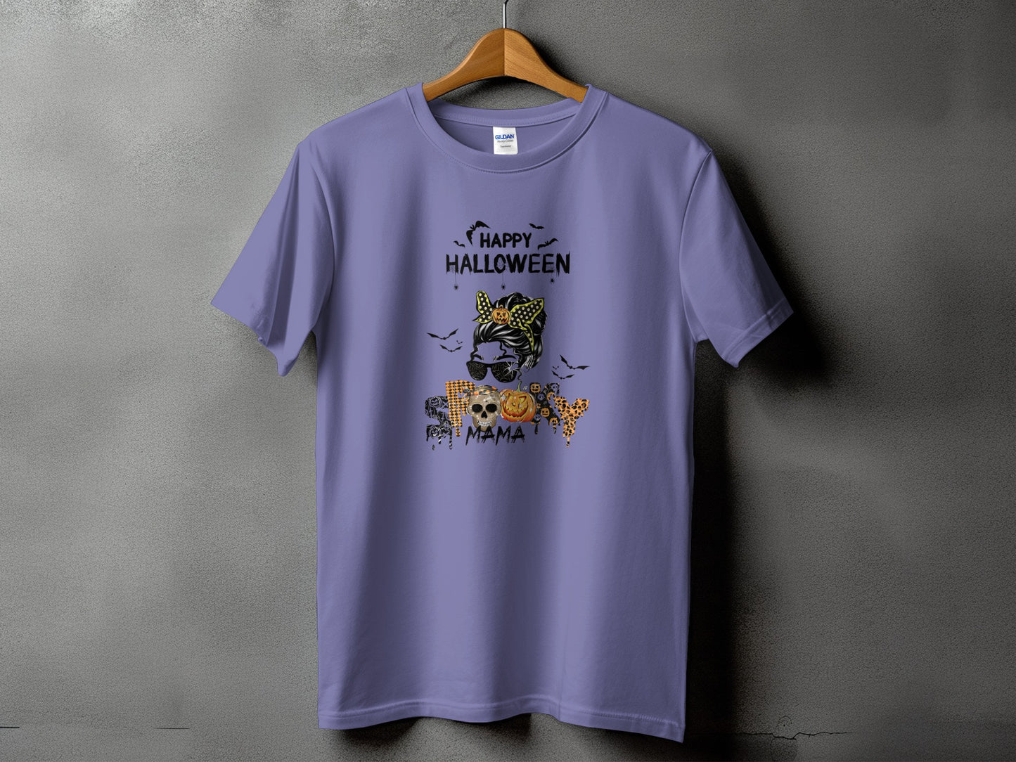Purple t-shirt with "Happy Halloween" and "Spooky Mama" graphic featuring skulls and pumpkins.