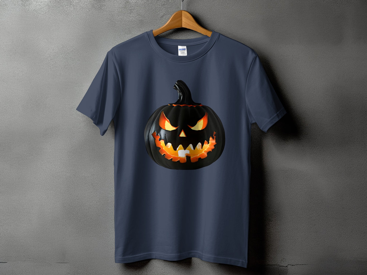 Dark t-shirt with a glowing, sinister jack-o'-lantern graphic.