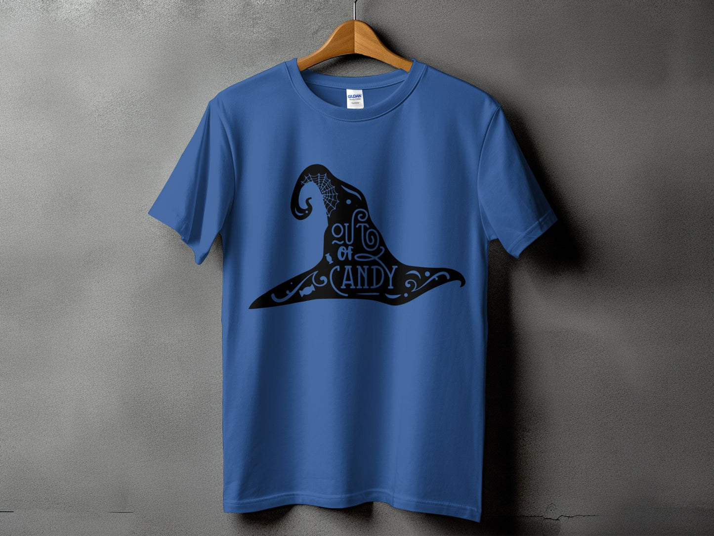Blue t-shirt with a black witch hat graphic that reads "Out of Candy".