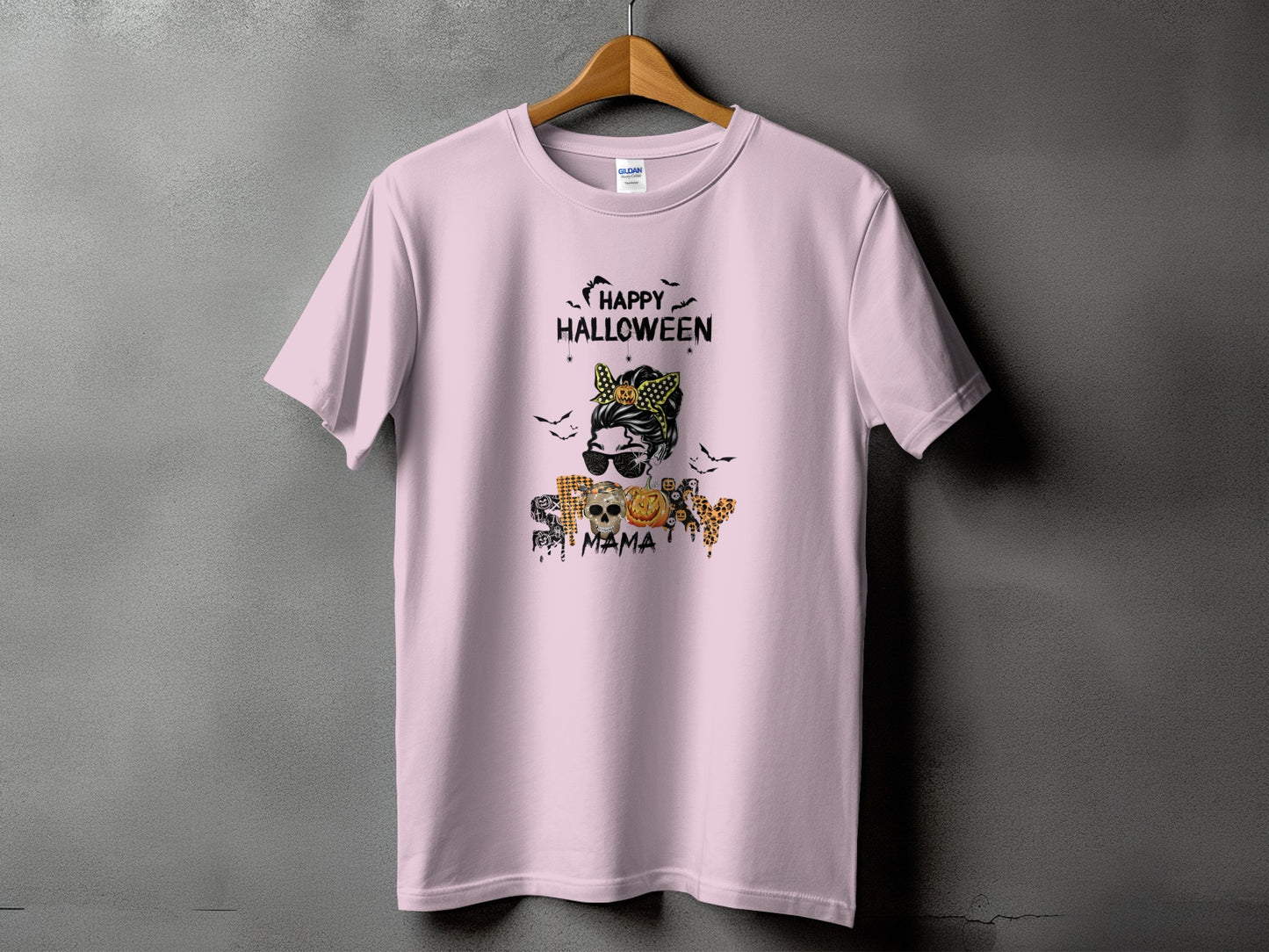 Pink t-shirt with "Happy Halloween" and "Mama" Halloween graphic.
