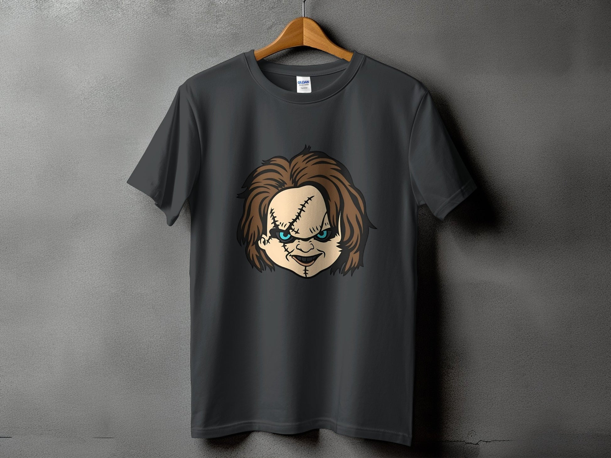 Dark grey t-shirt with Chucky doll face graphic.