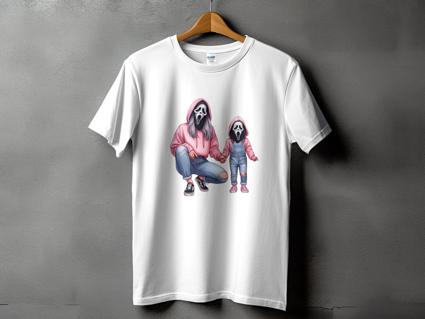 T-shirt with ghost face graphic of adult and child in hoodies and jeans.