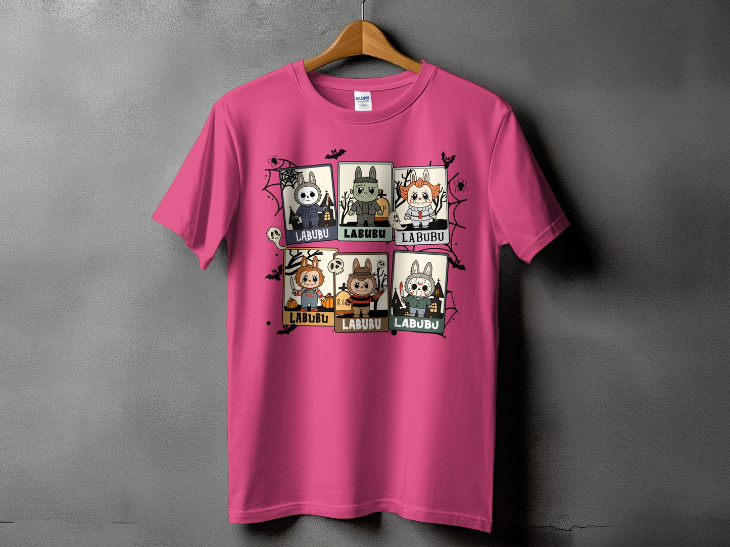 Pink t-shirt with six cartoon horror characters and "LABUBU" text.