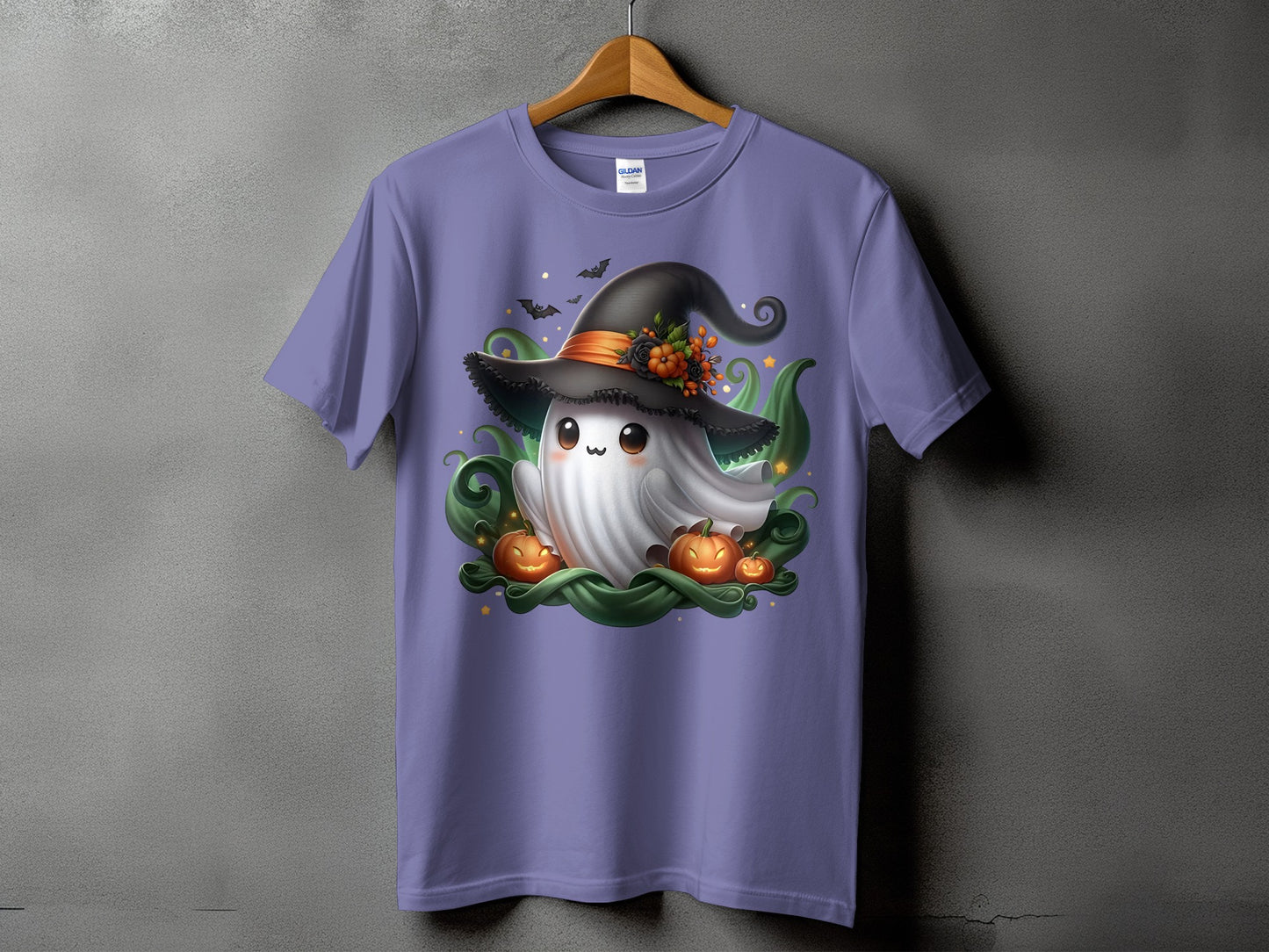 Ghost in witch hat with pumpkins and bats on a purple t-shirt.