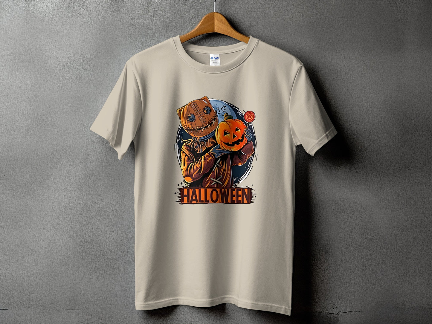 Light tan t-shirt with "Halloween" text and a pumpkin-headed character holding a pumpkin.